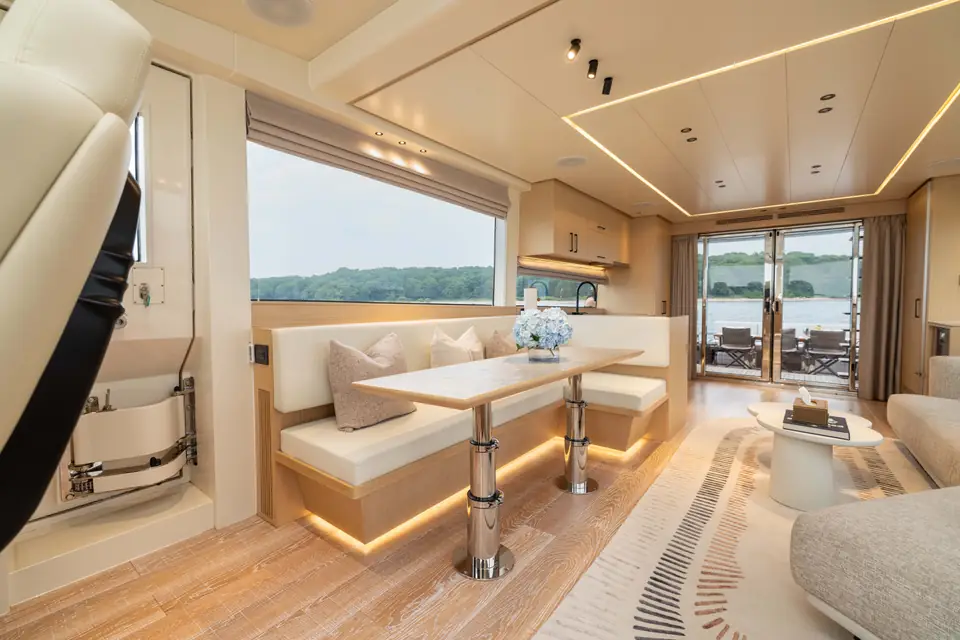 The galley: run of joinery under the window band, work surface clear, appliances flush.